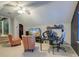 Attic bonus room with a desk and chair, hardwood floors, television, and comfortable seating at 3298 Heathland Way, Mount Pleasant, SC 29466