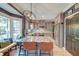 Updated kitchen featuring granite countertops, stainless steel appliances, and a large island at 3298 Heathland Way, Mount Pleasant, SC 29466