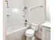 Well-lit bathroom featuring a shower-tub combination and vanity at 350 Oak Park St, Summerville, SC 29486