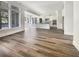 Open floor plan connects the kitchen with stainless steel appliances and dining area at 350 Oak Park St, Summerville, SC 29486
