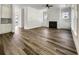 Bright living room with hardwood floors, fireplace, and large windows at 350 Oak Park St, Summerville, SC 29486