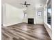 Bright living room features a fireplace, recessed lighting, and luxury vinyl plank flooring at 350 Oak Park St, Summerville, SC 29486