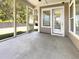 Outdoor patio with screens for enjoying the backyard view and natural light with easy access to the interior at 350 Oak Park St, Summerville, SC 29486