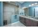 Elegant bathroom features double sinks, granite countertop, and a tiled walk-in shower at 3769 Maidstone Dr, Mount Pleasant, SC 29466