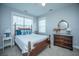 Traditional bedroom featuring a bed, wood furniture, and a ceiling fan at 3769 Maidstone Dr, Mount Pleasant, SC 29466