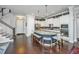 Spacious kitchen featuring a large island with bar seating, white cabinets, and stainless steel appliances at 3769 Maidstone Dr, Mount Pleasant, SC 29466