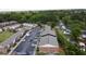 A brick building with large parking lot nestled within a lush green landscape in a beautiful residential area at 415 Parkdale Dr # 2F, Charleston, SC 29414