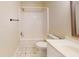 Cozy bathroom with a shower-tub combo, tiled floors, and a classic white vanity at 415 Parkdale Dr # 2F, Charleston, SC 29414