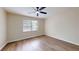 Inviting bedroom featuring a ceiling fan, natural light from the window and wood-look floors at 415 Parkdale Dr # 2F, Charleston, SC 29414