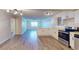 Open-concept kitchen showcases stainless steel appliances and leads into the living area at 415 Parkdale Dr # 2F, Charleston, SC 29414