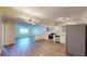 Modern kitchen featuring stainless steel appliances, white cabinets, and a sleek backsplash at 415 Parkdale Dr # 2F, Charleston, SC 29414