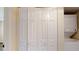 Laundry space with a new washer and dryer, next to folding doors at 415 Parkdale Dr # 2F, Charleston, SC 29414