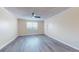 Bright living room featuring fresh paint, a window, and modern light-gray flooring at 415 Parkdale Dr # 2F, Charleston, SC 29414