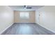 Inviting living room filled with natural light, featuring contemporary flooring and neutral walls at 415 Parkdale Dr # 2F, Charleston, SC 29414