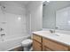 Bright bathroom featuring a shower-tub combo, modern sink with storage, and clean finishes at 424 Carrara Dr, Summerville, SC 29486