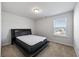 Carpeted bedroom with window and queen bed features natural light at 424 Carrara Dr, Summerville, SC 29486