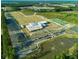 Aerial view of the Cane Bay YMCA, featuring sports fields, courts, and parking at 424 Carrara Dr, Summerville, SC 29486