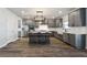 Modern kitchen featuring a center island, stainless steel appliances, and sleek gray cabinetry at 424 Carrara Dr, Summerville, SC 29486