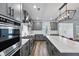 Stylish kitchen featuring stainless steel appliances and sleek gray cabinetry at 424 Carrara Dr, Summerville, SC 29486