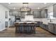 Spacious kitchen featuring a center island, stainless steel appliances, and sleek gray cabinetry at 424 Carrara Dr, Summerville, SC 29486