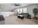Comfortable living room featuring a ceiling fan, cozy seating, and natural light at 424 Carrara Dr, Summerville, SC 29486