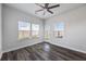 Well-lit sunroom with hardwood floors, white walls, and a glass door at 424 Carrara Dr, Summerville, SC 29486