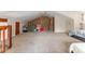 Spacious carpeted attic featuring a brick accent wall at 4407 S Shirley Dr, North Charleston, SC 29418