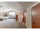 Large attic featuring stairs, a window, and bedroom furniture at 4407 S Shirley Dr, North Charleston, SC 29418