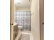 Cozy bathroom with patterned shower curtain and classic fixtures for essential comfort at 4407 S Shirley Dr, North Charleston, SC 29418