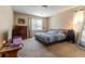 Serene bedroom with natural light and comfortable furnishings creates a restful retreat at 4407 S Shirley Dr, North Charleston, SC 29418