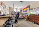 Bedroom with a desk, easel, bookshelf, aquarium, and various wall decorations at 4407 S Shirley Dr, North Charleston, SC 29418