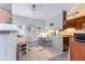 Charming kitchen with dinette set and retro cabinetry perfect for cooking and gatherings at 4407 S Shirley Dr, North Charleston, SC 29418