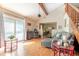 Spacious living room with vaulted ceilings, wood floors, and a staircase at 4407 S Shirley Dr, North Charleston, SC 29418
