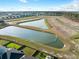 Community aerial view of lakes and landscaping, highlighting new construction homes and recreational areas at 490 Rowley Ln, Summerville, SC 29486