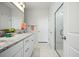 Modern bathroom featuring white cabinets, granite countertops, a large mirror, and a glass-enclosed shower at 490 Rowley Ln, Summerville, SC 29486