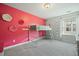 Bright bedroom featuring a loft bed and pink accent wall, perfect for a space at 490 Rowley Ln, Summerville, SC 29486