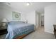 Bedroom features a large bed, neutral colors, and access to an ensuite bathroom at 490 Rowley Ln, Summerville, SC 29486