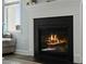 Close-up of a fireplace with black mantel and hearth, radiating warmth and comfort at 490 Rowley Ln, Summerville, SC 29486