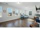 Spacious playroom with hardwood floors, many windows and fun decorations, perfect for  at 490 Rowley Ln, Summerville, SC 29486