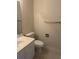 Standard bathroom with a white sink, toilet, and neutral-toned walls, offering functionality at 505 Sunnyside Way, Summerville, SC 29485