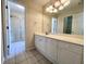 Bathroom with shower, a large mirror, and lots of storage in the vanity at 505 Sunnyside Way, Summerville, SC 29485
