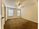 Bedroom featuring a ceiling fan and two windows offering natural light at 505 Sunnyside Way, Summerville, SC 29485