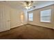 Bedroom with ceiling fan, plush carpet, and plenty of natural light at 505 Sunnyside Way, Summerville, SC 29485