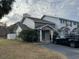 Inviting townhome features stone accents, a well-manicured lawn, and convenient parking at 505 Sunnyside Way, Summerville, SC 29485