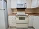 Close up of kitchen with stove, oven, microwave and lots of storage space at 505 Sunnyside Way, Summerville, SC 29485