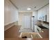 Well-lit kitchen featuring white cabinets, laminate countertops, tile flooring and modern appliances at 505 Sunnyside Way, Summerville, SC 29485