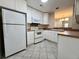 Bright kitchen with ample cabinet space, modern appliances, and easy access to dining area at 505 Sunnyside Way, Summerville, SC 29485