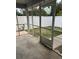 Screened patio area with a view of the fenced backyard, offering a comfortable outdoor space at 505 Sunnyside Way, Summerville, SC 29485