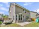 Back exterior featuring patio, backyard, play set, and home at 5228 Fallow Fawns Rd, Hollywood, SC 29449