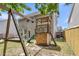 Backyard featuring playground, swing set, patio, and home at 5228 Fallow Fawns Rd, Hollywood, SC 29449